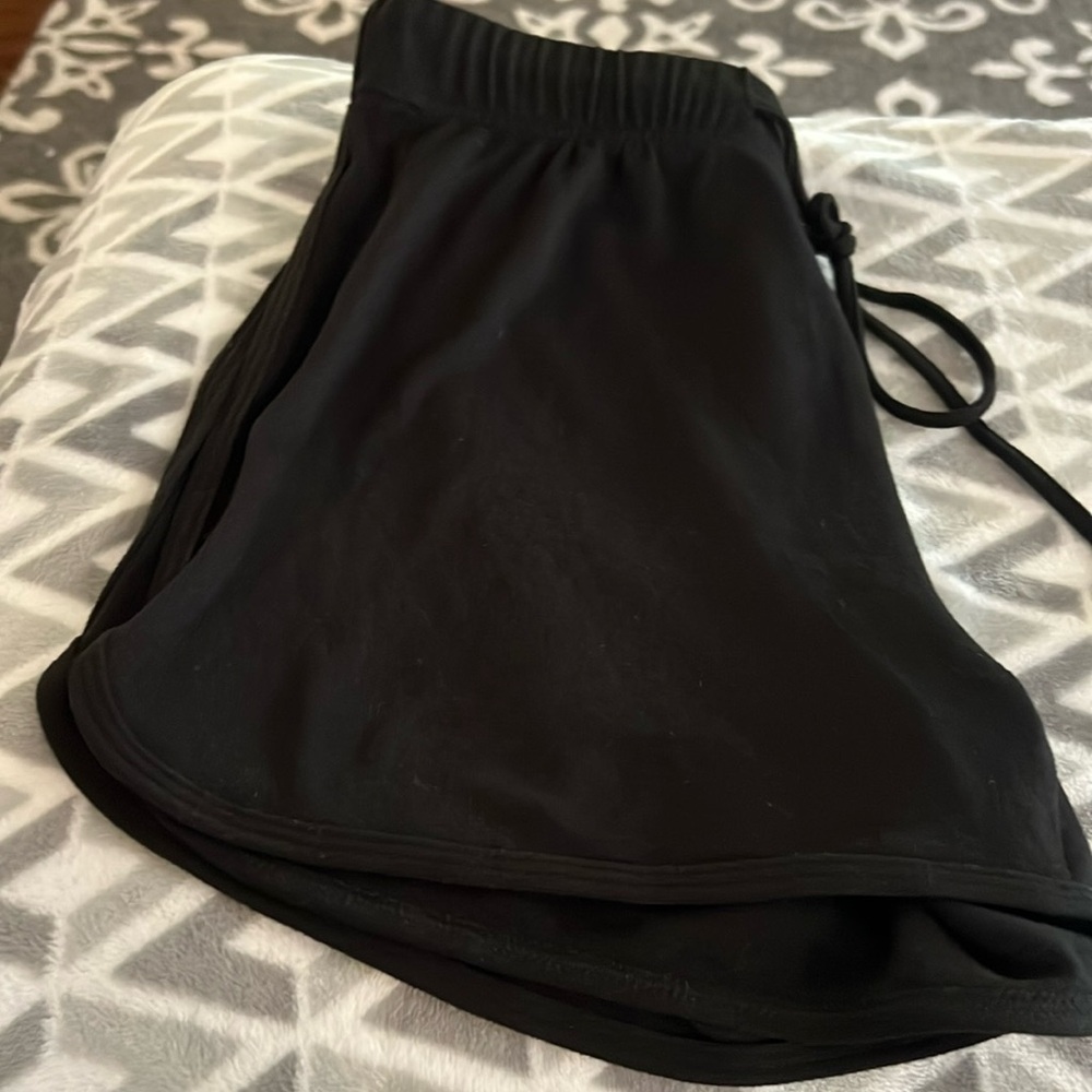 All Black Dolphin Shorts